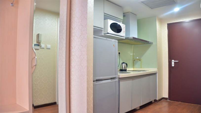 Imagen de la habitación del Hotel China Sunshine Apartment Dacheng International. Foto 14