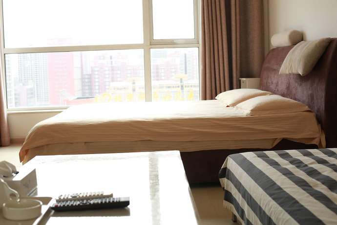 Imagen de la habitación del Hotel China Sunshine Apartment Dacheng International. Foto 15