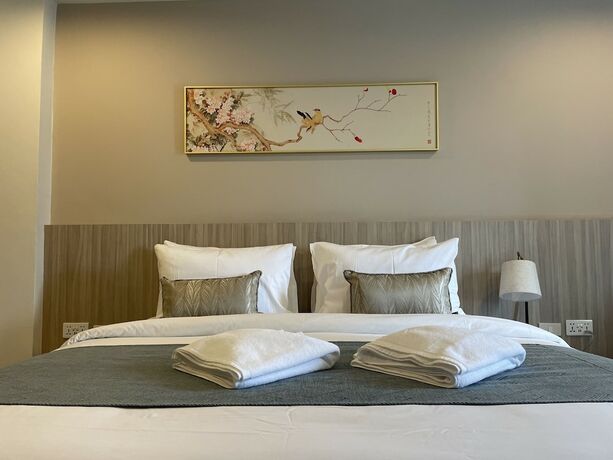 Imagen de la habitación del Hotel Chinatown Living Hatyai. Foto 13