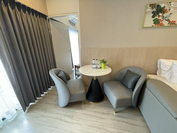 Imagen de la habitación del Hotel Chinatown Living Hatyai. Foto 19
