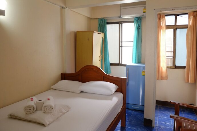 Imagen de la habitación del Hotel Chinda House. Foto 8