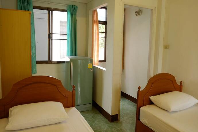 Imagen de la habitación del Hotel Chinda House. Foto 9