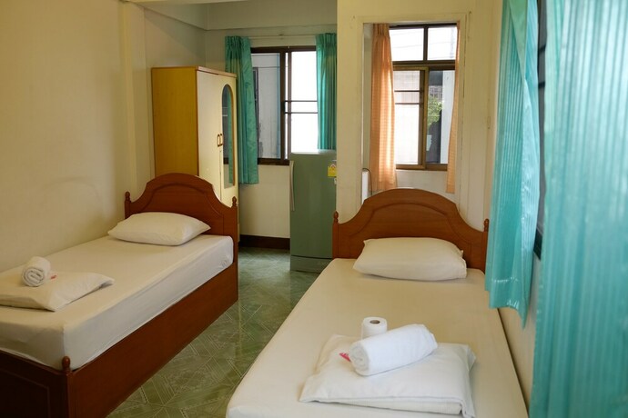Imagen de la habitación del Hotel Chinda House. Foto 11