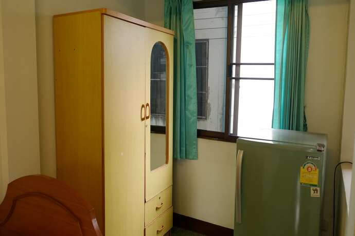 Imagen de la habitación del Hotel Chinda House. Foto 12
