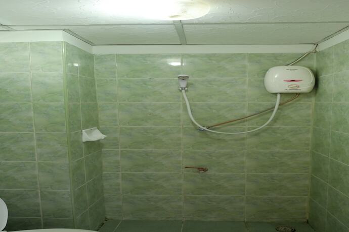 Imagen de la habitación del Hotel Chinda House. Foto 13