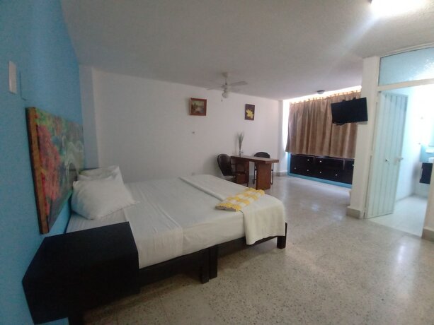 Imagen de la habitación del Hotel Chinelos Express. Foto 14