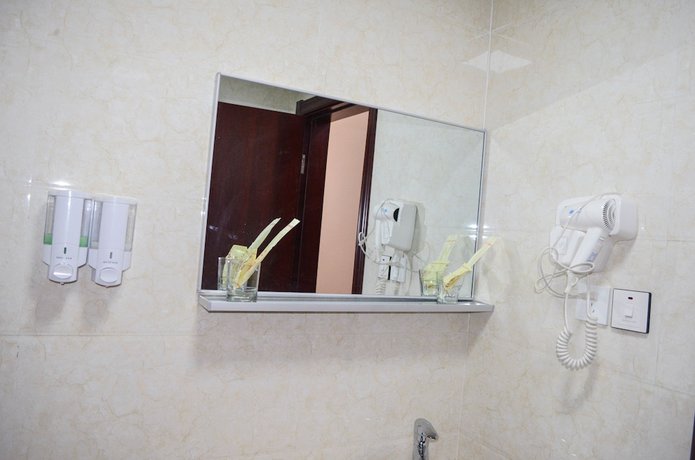 Imagen de la habitación del Hotel Chinese Business. Foto 4