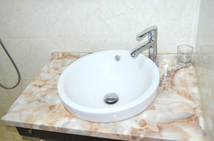 Imagen de la habitación del Hotel Chinese Business. Foto 5