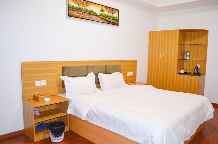 Imagen de la habitación del Hotel Chinese Business. Foto 8