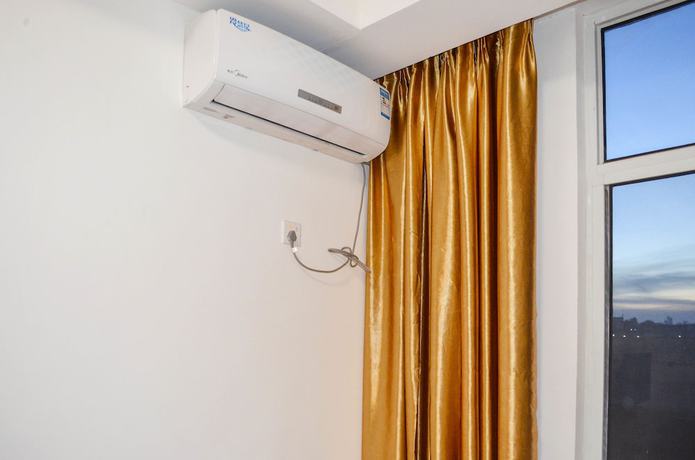 Imagen de la habitación del Hotel Chinese Business. Foto 10