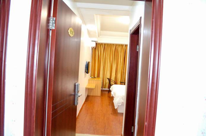 Imagen de la habitación del Hotel Chinese Business. Foto 11