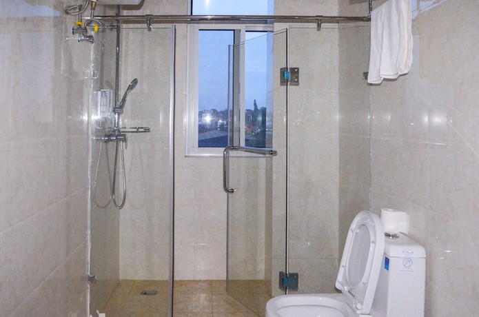 Imagen de la habitación del Hotel Chinese Business. Foto 13