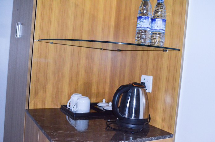 Imagen de la habitación del Hotel Chinese Business. Foto 15