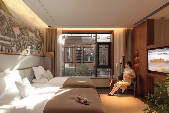 Imagen de la habitación del Hotel Chinese-style garden resort hotel. Foto 9