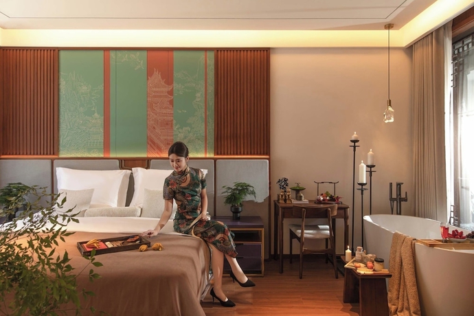 Imagen de la habitación del Hotel Chinese-style garden resort hotel. Foto 10