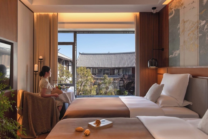 Imagen de la habitación del Hotel Chinese-style garden resort hotel. Foto 11
