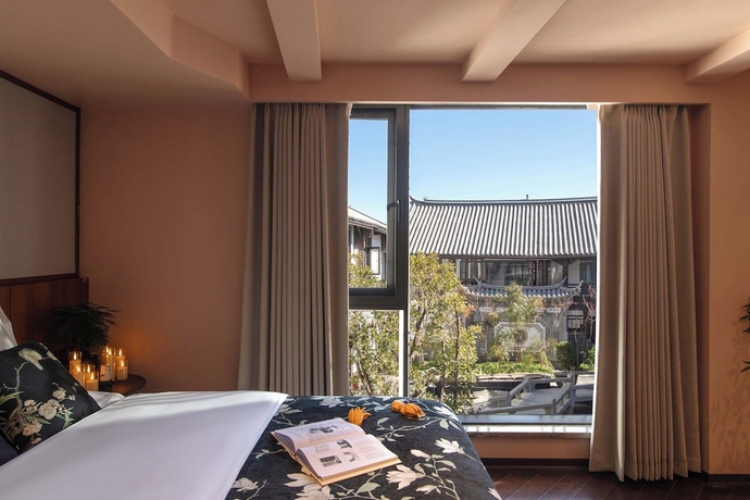 Imagen de la habitación del Hotel Chinese-style garden resort hotel. Foto 12
