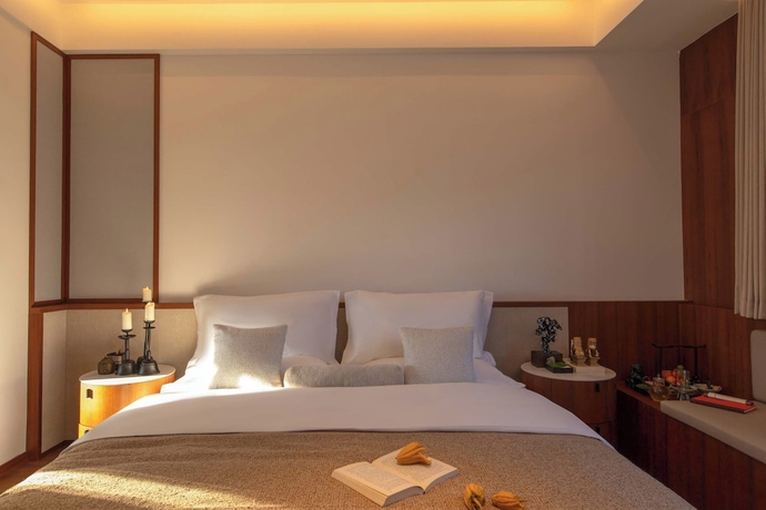 Imagen de la habitación del Hotel Chinese-style garden resort hotel. Foto 15