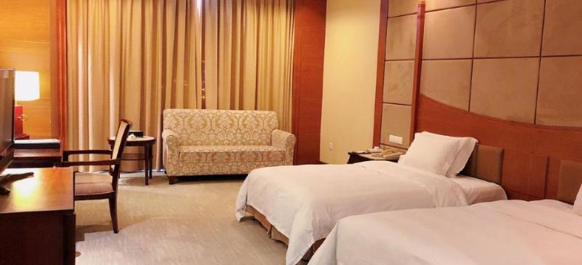 Imagen de la habitación del Hotel Chinflux Mandarin Hotel. Foto 11