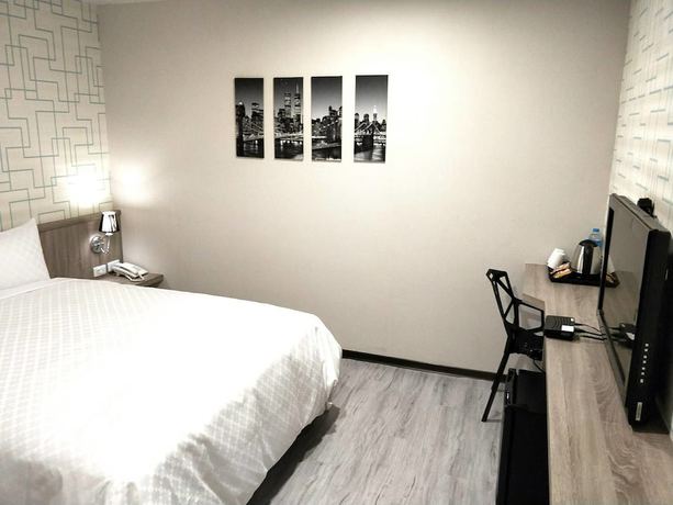 Imagen de la habitación del Hotel Ching She. Foto 3