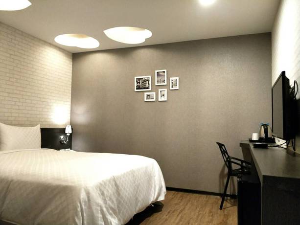 Imagen de la habitación del Hotel Ching She. Foto 4