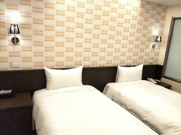 Imagen de la habitación del Hotel Ching She. Foto 6