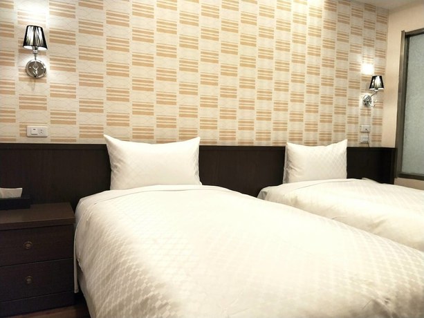 Imagen de la habitación del Hotel Ching She. Foto 9