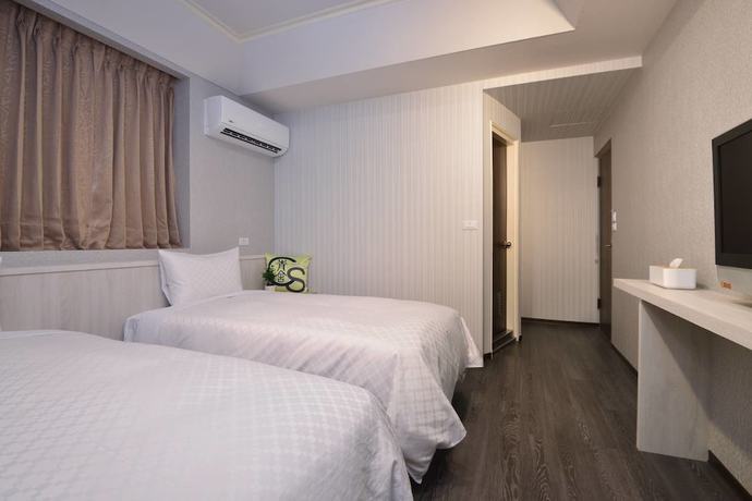 Imagen de la habitación del Hotel Ching She. Foto 11