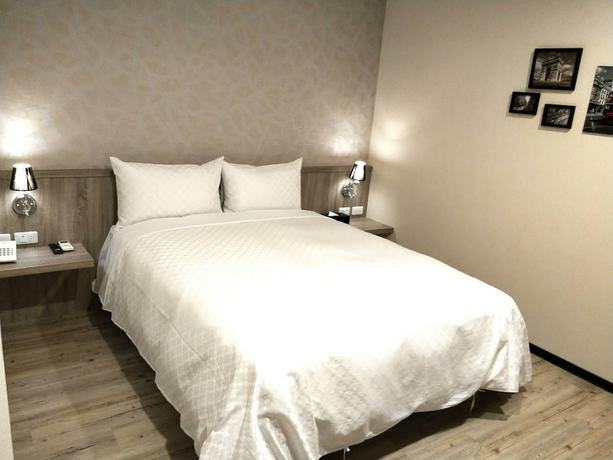 Imagen de la habitación del Hotel Ching She. Foto 12