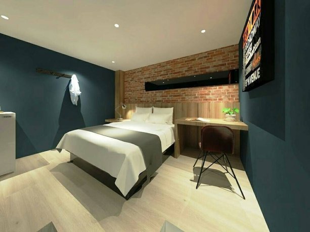 Imagen de la habitación del Hotel Ching She. Foto 14