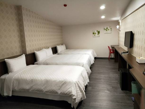 Imagen de la habitación del Hotel Ching She. Foto 15