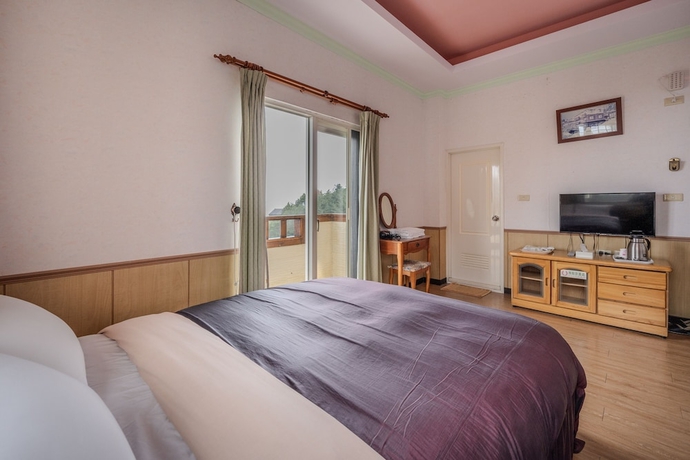 Imagen de la habitación del Hotel Chingjing New Paradise BandB. Foto 3