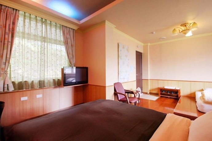 Imagen de la habitación del Hotel Chingjing New Paradise BandB. Foto 7