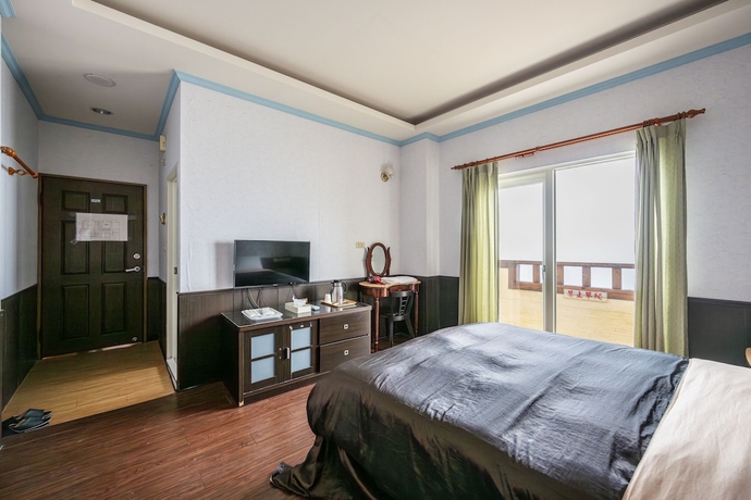 Imagen de la habitación del Hotel Chingjing New Paradise BandB. Foto 9