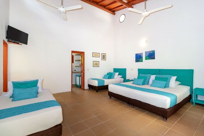 Imagen de la habitación del Hotel Chiniu. Foto 16