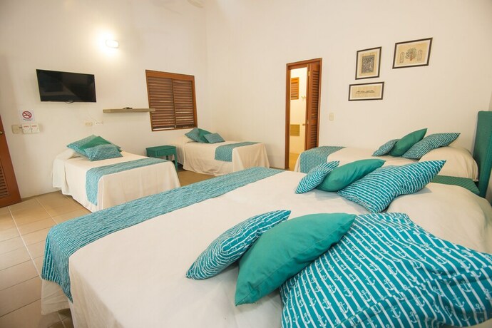 Imagen de la habitación del Hotel Chiniu. Foto 23