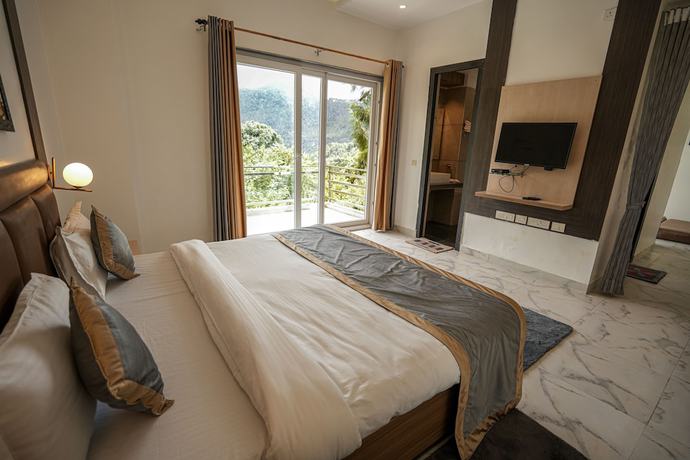 Imagen de la habitación del Hotel Chirping Hills Resort Bhimtal. Foto 7