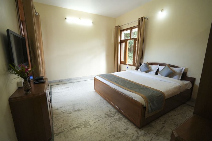 Imagen de la habitación del Hotel Chirping Hills Resort Bhimtal. Foto 8