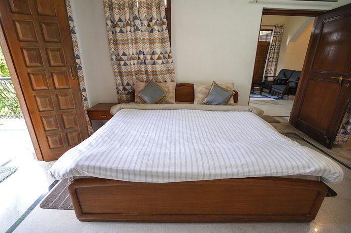Imagen de la habitación del Hotel Chirping Hills Resort Bhimtal. Foto 9