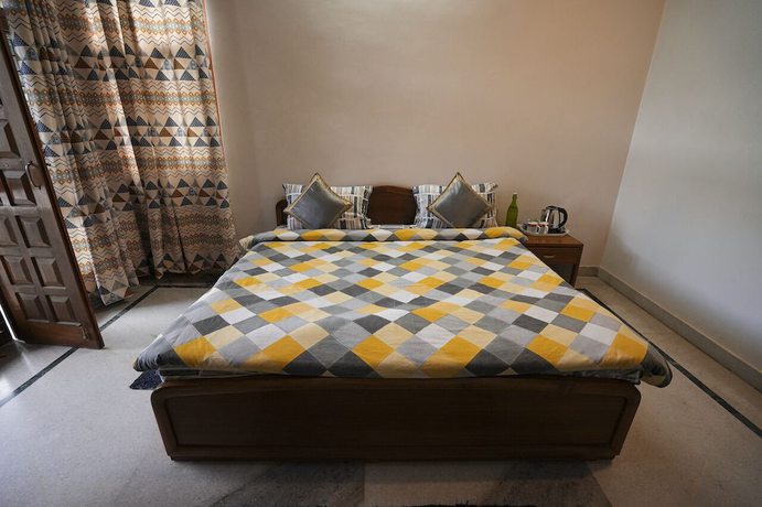 Imagen de la habitación del Hotel Chirping Hills Resort Bhimtal. Foto 12