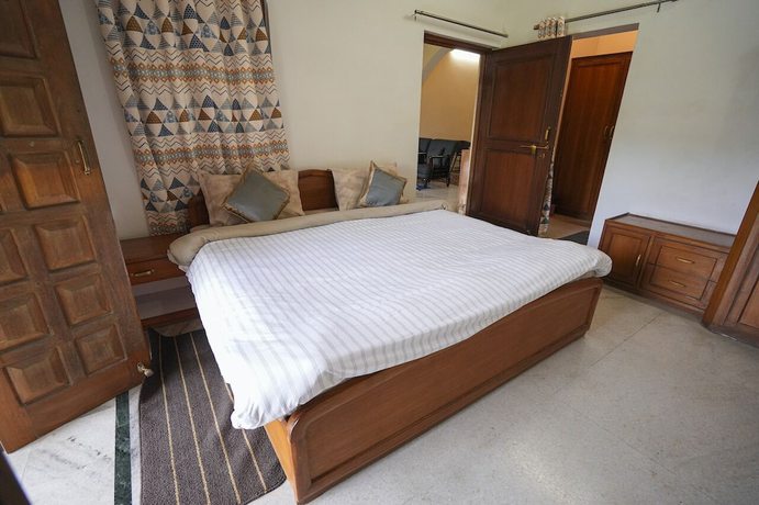 Imagen de la habitación del Hotel Chirping Hills Resort Bhimtal. Foto 18