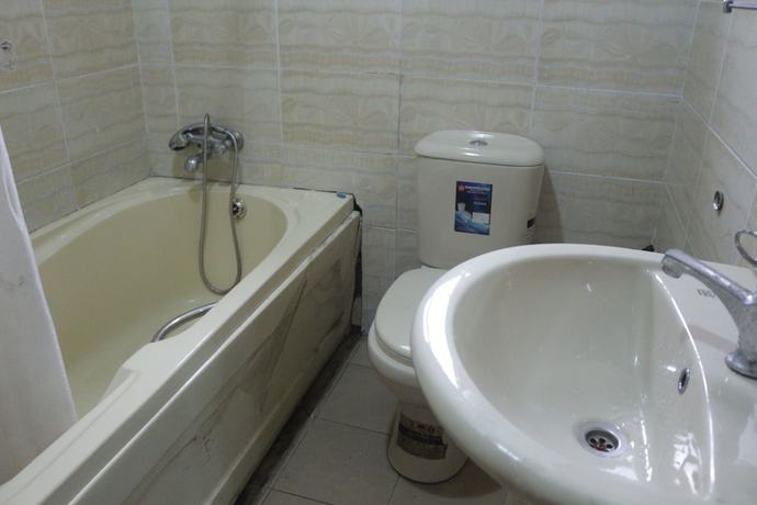 Imagen de la habitación del Hotel Chisam Suites Annex. Foto 11