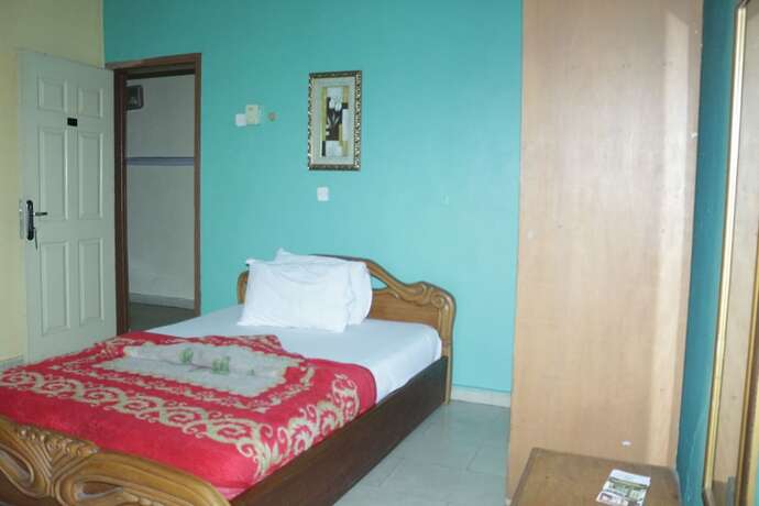 Imagen de la habitación del Hotel Chisam Suites. Foto 14