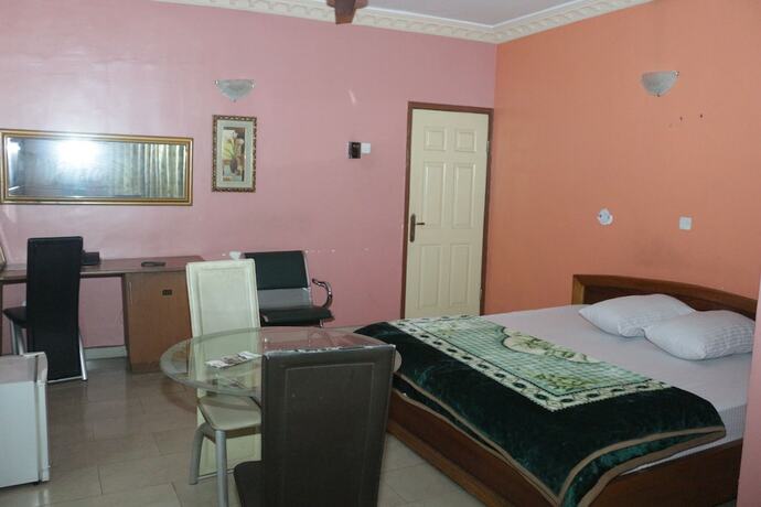 Imagen de la habitación del Hotel Chisam Suites. Foto 16