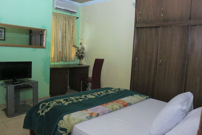 Imagen de la habitación del Hotel Chisam Suites. Foto 20