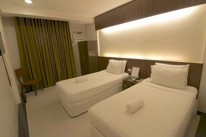 Imagen de la habitación del Hotel Chito\'s. Foto 7