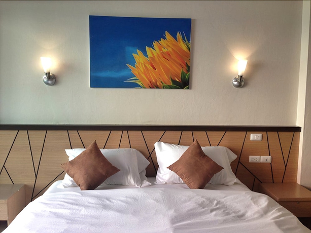 Imagen de la habitación del Hotel Chitra Suite. Foto 9