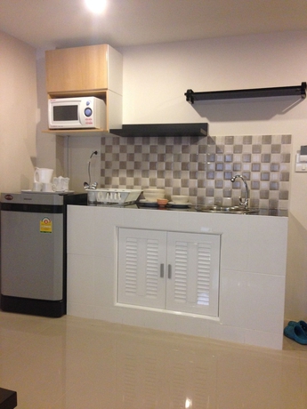 Imagen de la habitación del Hotel Chitra Suite. Foto 11