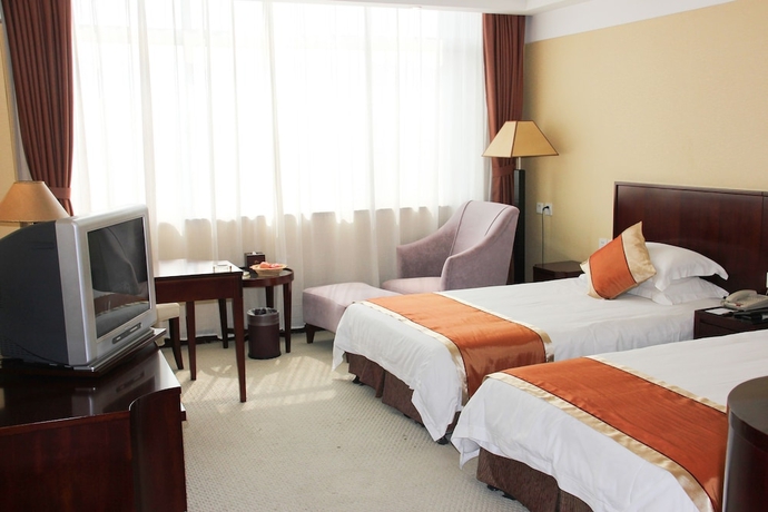 Imagen de la habitación del Hotel Chizhou Dajiuhua. Foto 14