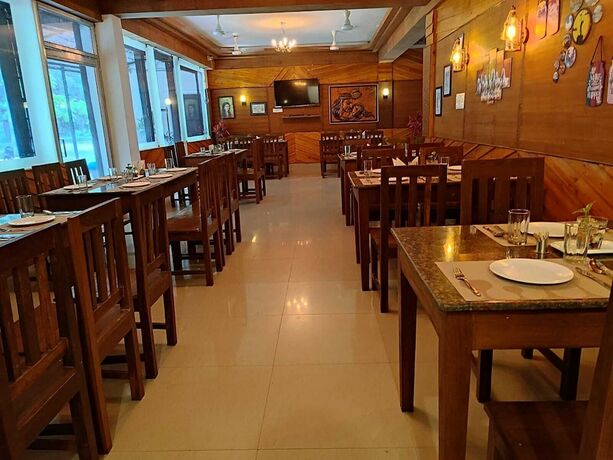 Imagen del bar/restaurante del Hotel Chocolate Inn Rainforest Resort. Foto 12